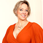 First pic of Mature MILF Dee Williams uncups her large tits before showing her pink snatch