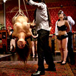 Second pic of Blond sex slaves are suspended during a dinner party before being used for sex