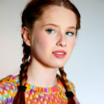 Second pic of Young girl Laura Lit gets naked with her hair in braided pigtails