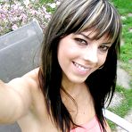 First pic of Cute brunette girl with big tits undressing outdoor and posing
