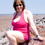 First pic of Mature UK plumper Speedy Bee takes off her bikini top during a trip to the sea