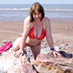 Third pic of Mature UK plumper Speedy Bee takes off her bikini top during a trip to the sea