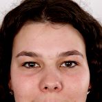 First pic of Amateur girl with long wavy hair takes off all her clothes during solo action