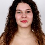 Second pic of Amateur girl with long wavy hair takes off all her clothes during solo action