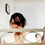 First pic of Pregnant Latina chick Talia dildos her horny pussy on a chair