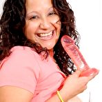 Fourth pic of Pregnant Latina woman shows her heavy tits while dildoing her pussy