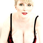 First pic of Pregnant European MILF Casey Deluxe unveiling huge milky boobs in stockings