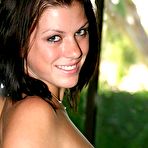 Second pic of First timer Brandy uncovers her perky boobs before parting her pink pussy