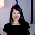 First pic of Nice young girl Andi Land slips a multi-coloured dildo in her shaved pussy