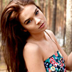 First pic of Beautiful teen Lachia A with small boobs spreading legs naked in the woods