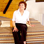 First pic of Redheaded grandmother takes a cumshot on her beaver after fucking