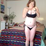 Second pic of Busty granny toys her pussy after playing with nipple clamps