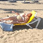 Third pic of Old SSBBW Val Gasmic dyes her hair red before exposing herself on the beach