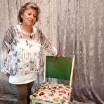 First pic of Big titted oma Caro pulls down her underwear to show her big ass in nylons