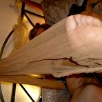 Fourth pic of Horny old granny Caro bares saggy big tits & hairy pussy closeup in pantyhose