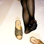 Third pic of Horny grandmother Caro pleasures her hairy pussy with a sex toy on her bed