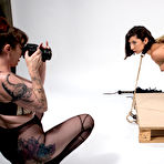 Third pic of Brunette submissive Vivi Marie is topped by a busty lesbian