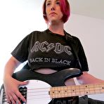 Second pic of Female bass player Sara Banks shows her tits and pussy atop a bed