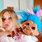 Second pic of Overweight blonde Curvy Meile displays her cleavage in a tempting fashion