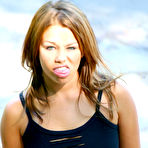 Third pic of Amateur model Dorothy piles up her hair at end of a sfw shoot in a miniskirt