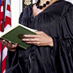 First pic of Hot MILF Claudia Valentine removes her judge's robes in her office