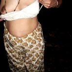 Fourth pic of Indian amateur exposes her small tits before showing her bare butt
