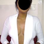 Third pic of Indian MILF displays her natural tits while wearing blue jeans