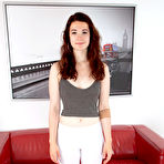 First pic of Pretty teen Flora slips her yoga pant down to flash her hairy muff