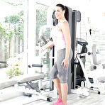 First pic of MILF Reagan Foxx removing spandex pants to display pussy on gym equipment