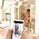 First pic of Busty MILF pornstar Syren De Mer giving bj in bathroom before hardcore sex