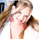 Second pic of Blonde student Kissy fondles her big natural tits with her hair in pigtails