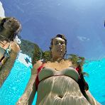 Fourth pic of Stunning young hotties have threesome lesbian humping pool fun