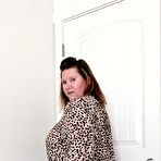Fourth pic of Fat amateur Busty Kris Ann removes her house robe to stand bare naked