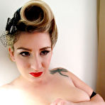 Fourth pic of Milf September Carrino shows her big natural boobies in close-up