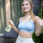 First pic of Blonde teen Lucia spritz her great body after getting totally naked