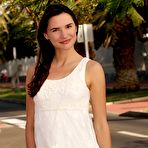 First pic of Dark haired girl flashes her bush in public before modeling naked by the sea