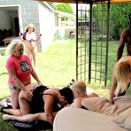 Fourth pic of Mature women engage in outdoor group sex with black and white men