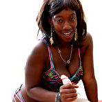 Second pic of Lustful ebony teen in bikini milking a white boner with her hands and tits