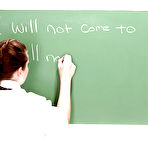 First pic of Busty babe Desirae loosing big pornstar tits from schoolgirl uniform