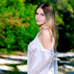 First pic of Young beauty Dakota Pink gets totally naked on a rock in the middle of a brook