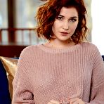 First pic of Redhead glam model Eliza Ibarra removes sweater on way to posing naked