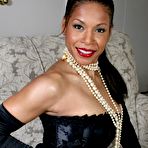 First pic of Ebony mature Semmie Desuora revealing her melons from a classy corset dress