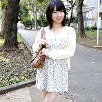 First pic of Japanese girl Madoka Adachi shows her bare legs during non-nude outdoor action