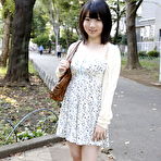 Second pic of Japanese girl Madoka Adachi shows her bare legs during non-nude outdoor action