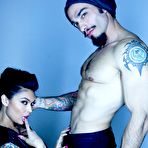 Fourth pic of Tattooed sexy pornstar Asian showing big tits in sheer lingerie