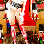 First pic of Frisky floosie in snazzy X-mas outfit revealing her pussy and big tits