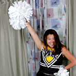 First pic of Asian amateur strips off cheerleader uniform before spreading pussy lips