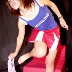 Second pic of Amateur Japanese cheerleader Naoko loosing bare ass from panties and skirt