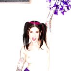 Second pic of Amateur babe Joanna Angel teases her milf ass in a cheerleader suit