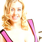 First pic of Blonde cheerleader Sapphire Blue uncovers her great tits atop her bed